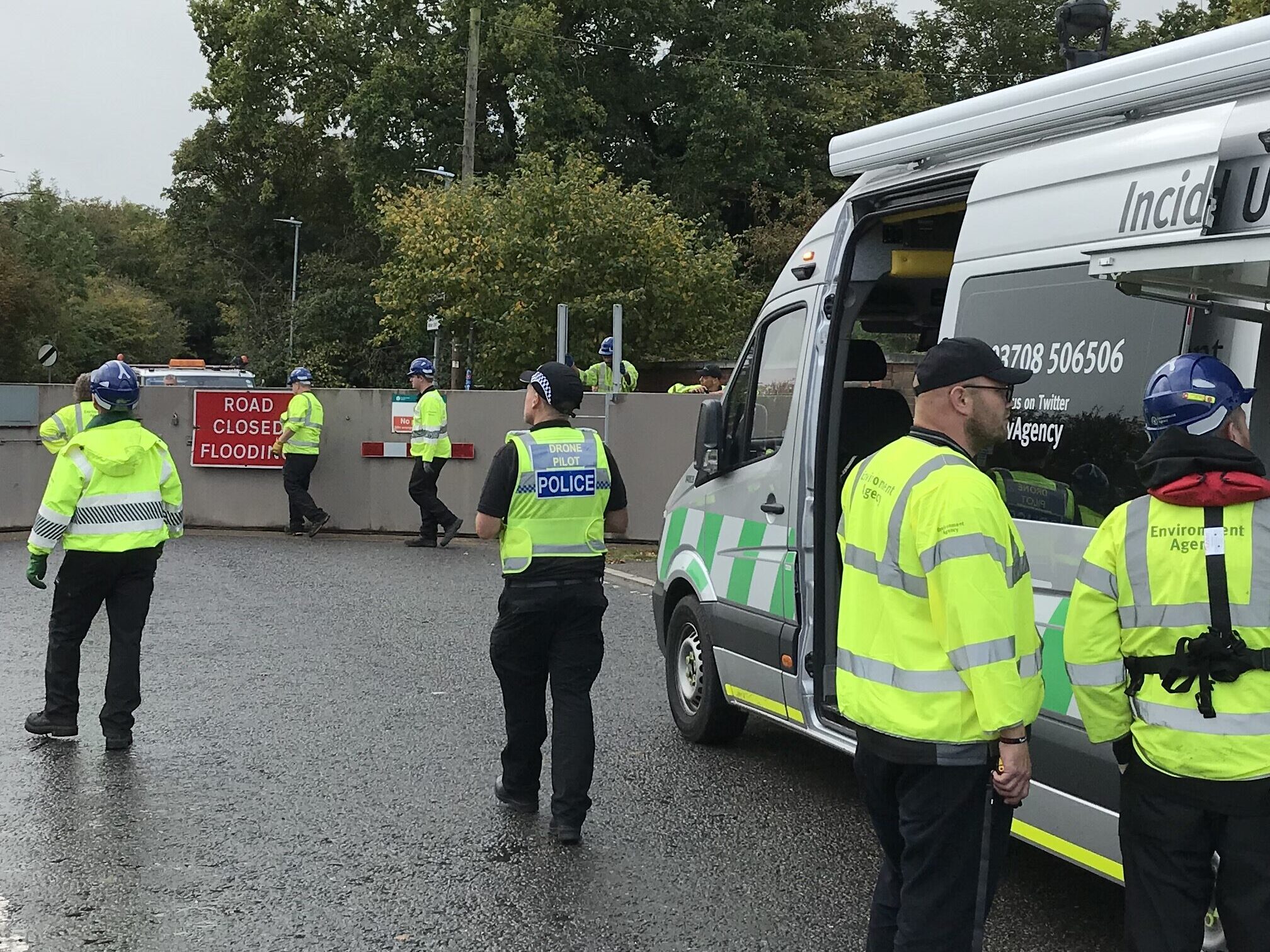 Environment Agency staff and police working together during a flood.