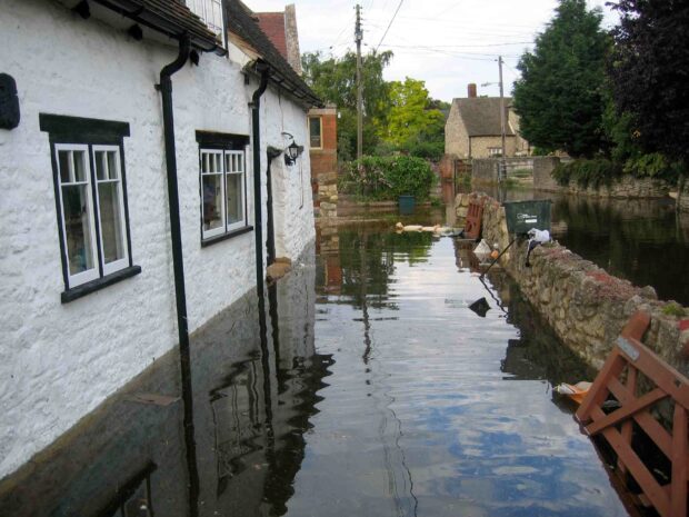 Floodwater outside a building.